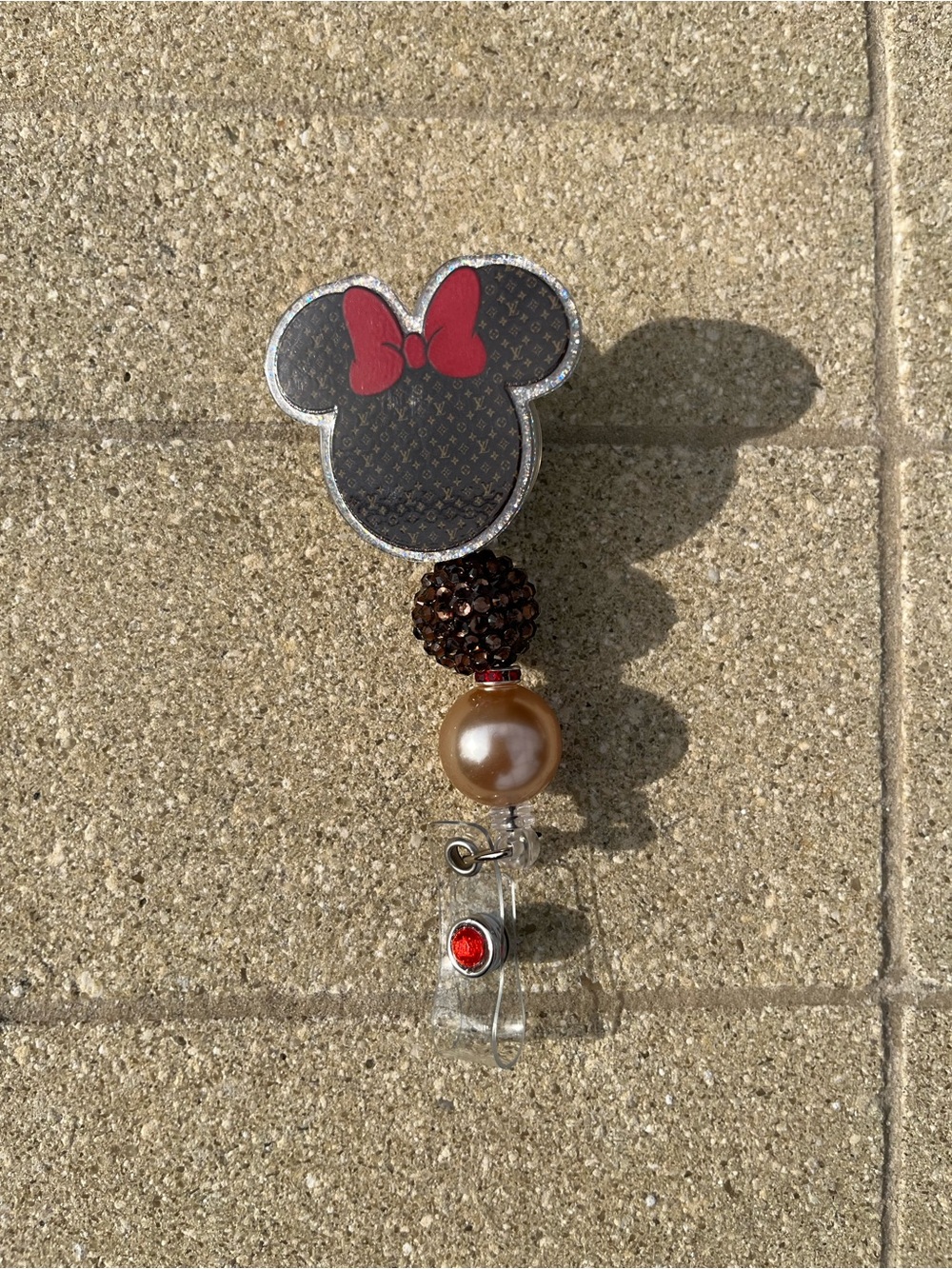 Hand Crafted  Inspired Character Badge Reel with Red Bow